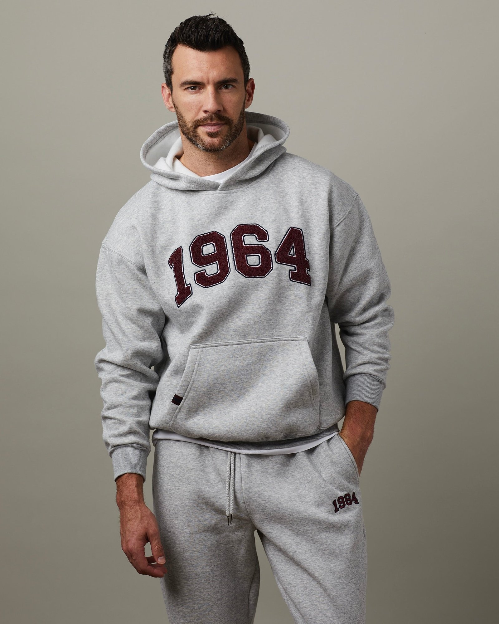 E-CommBannerImage1_593 1964 Unisex Hoodie - Grey - Image 1